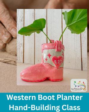 Hand-built western boot planter with glossy pink glaze holding green leaves, featured in a clay hand-building class at Burst of Butterflies in Chandler, Arizona.