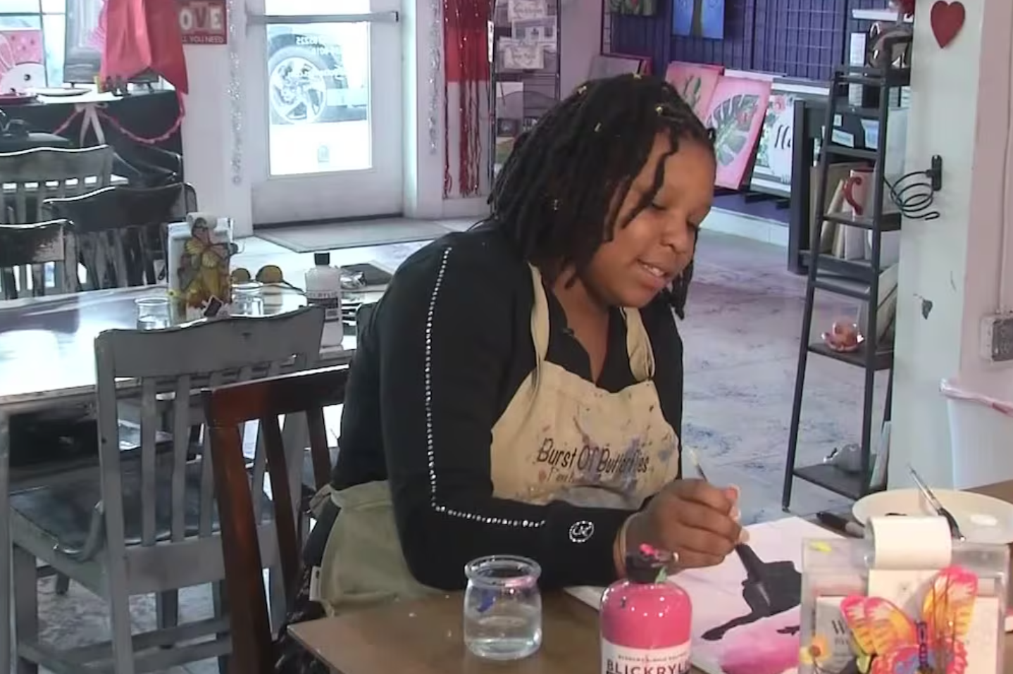 Finding Forever segment filmed at Burst of Butterflies Chandler featuring young artist painting